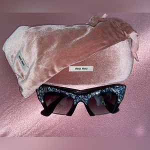 Miu Miu Rasoir Rock MU 01Q Cat Eye Black Silver Blue UAC-0A7 Sunglasses MU01QS